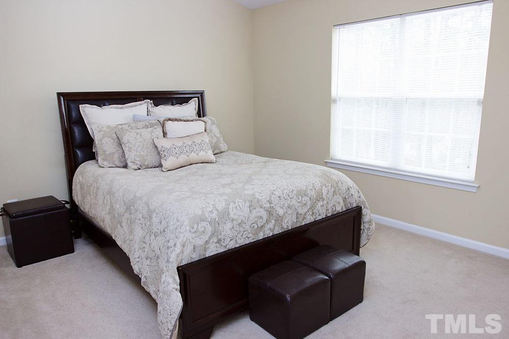 3537 Londonville Lane Raleigh, NC 27604 - Photo 8 of 21 a bedroom with bed and window