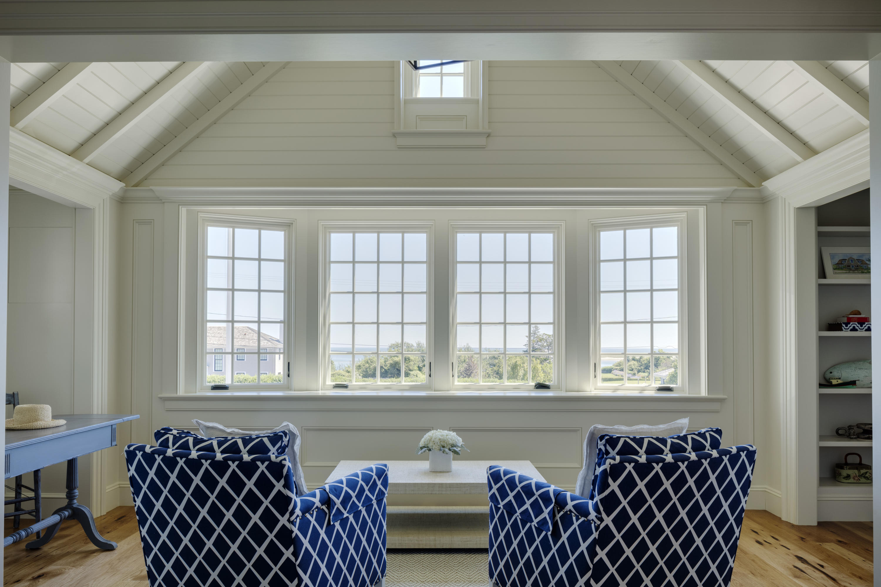 103 Shore Road Chatham, MA 02633 - Photo 20 of 32 a living room with a couch and a window