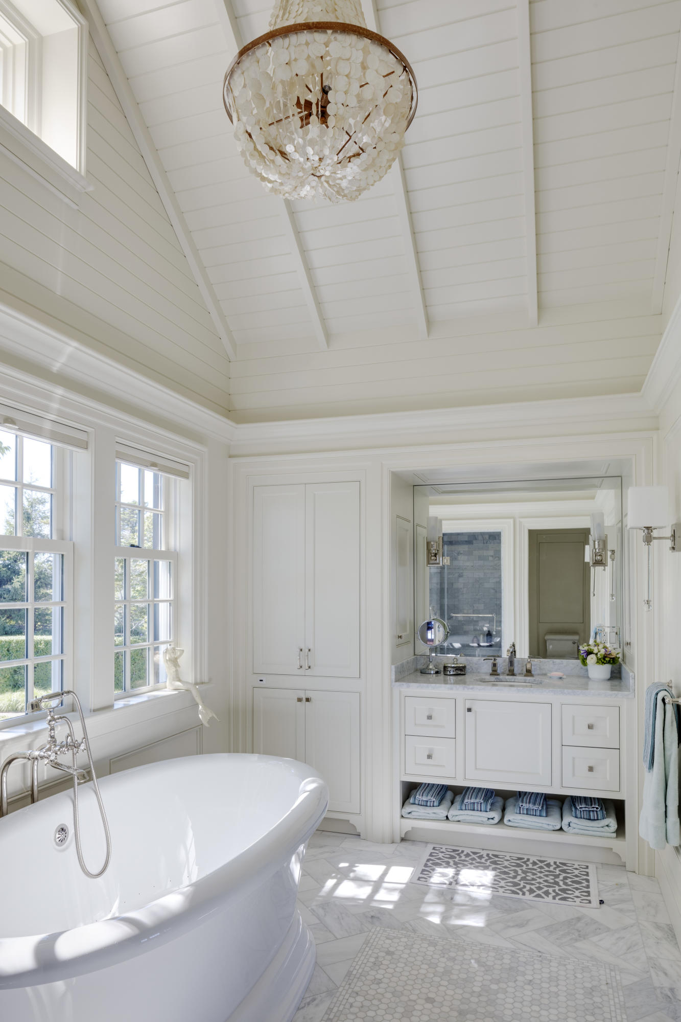 103 Shore Road Chatham, MA 02633 - Photo 23 of 32 a bathroom with a tub sink and mirror