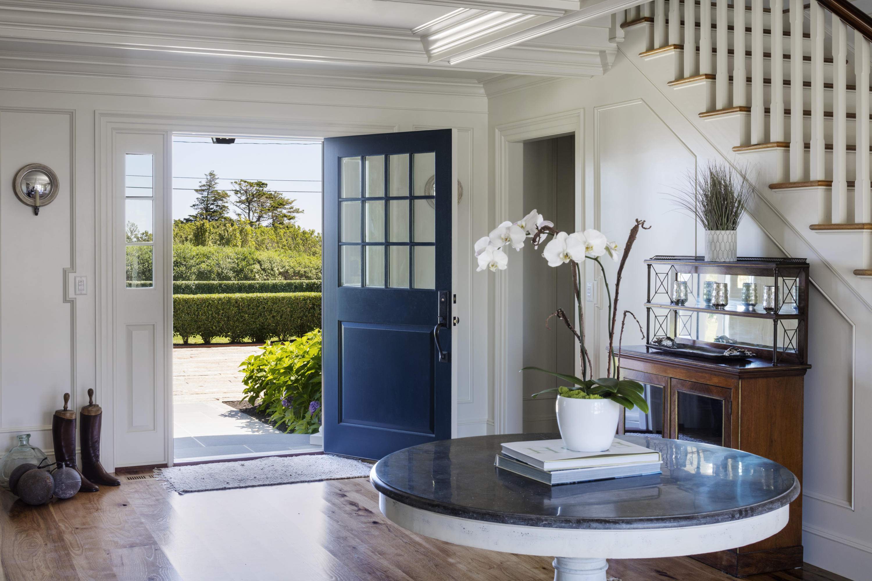 103 Shore Road Chatham, MA 02633 - Photo 5 of 32 a view of a dining room with furniture and a potted plant