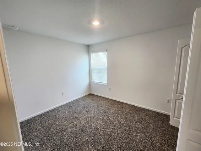 an empty room with closet
