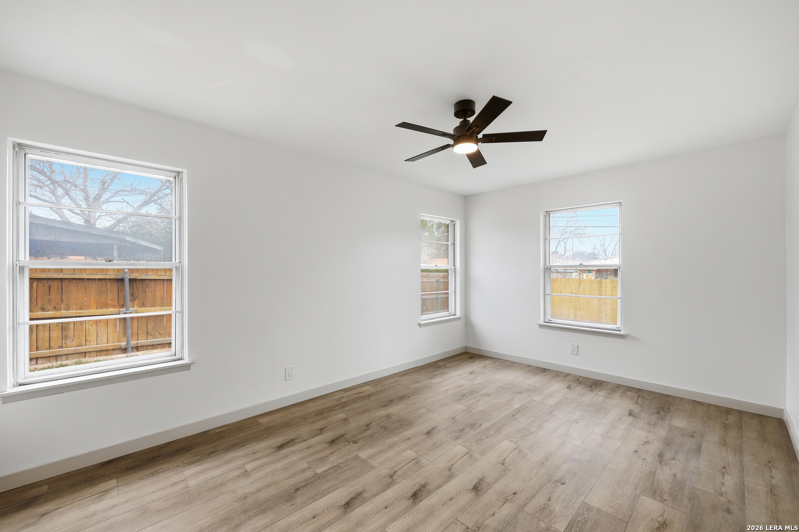 426 Zephyr Drive Windcrest, TX 78239 - Photo 23 of 33 a view of room with window and ceiling fan