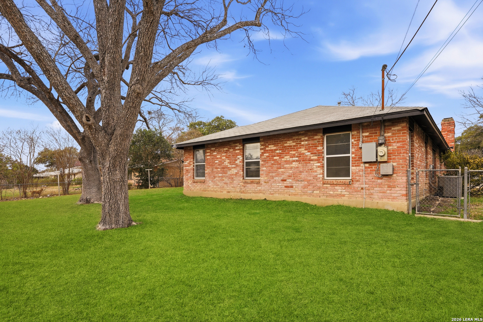 426 Zephyr Drive Windcrest, TX 78239 - Photo 33 of 33 a front view of a house with garden