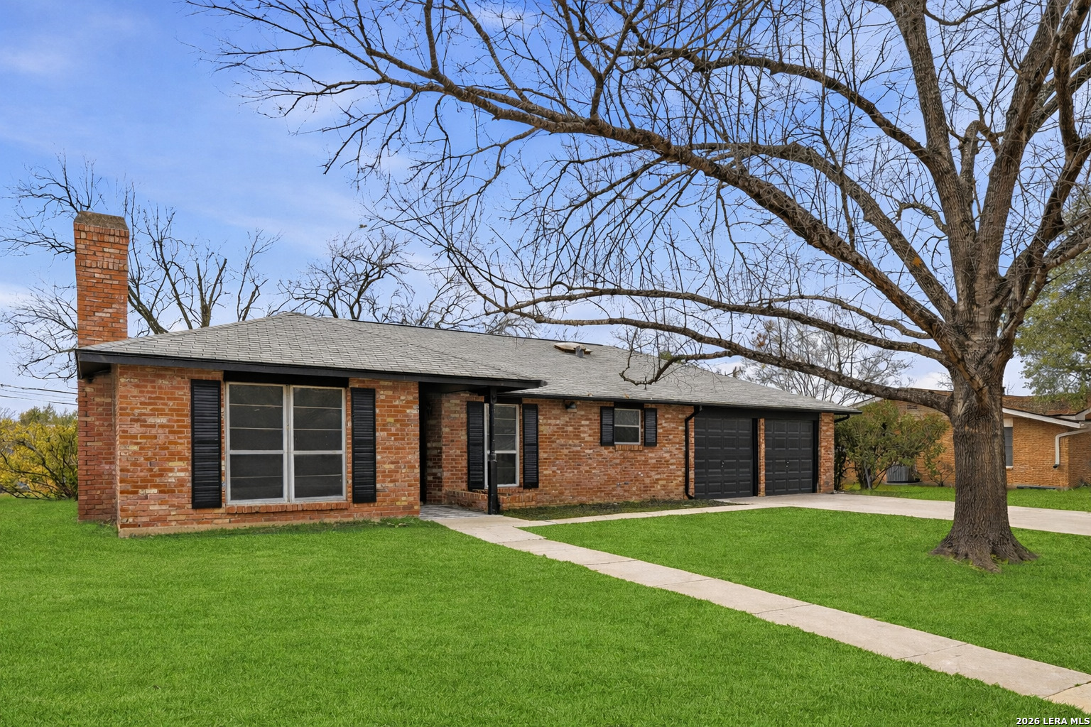 426 Zephyr Drive Windcrest, TX 78239 - Photo 5 of 33 front view of a house with a yard