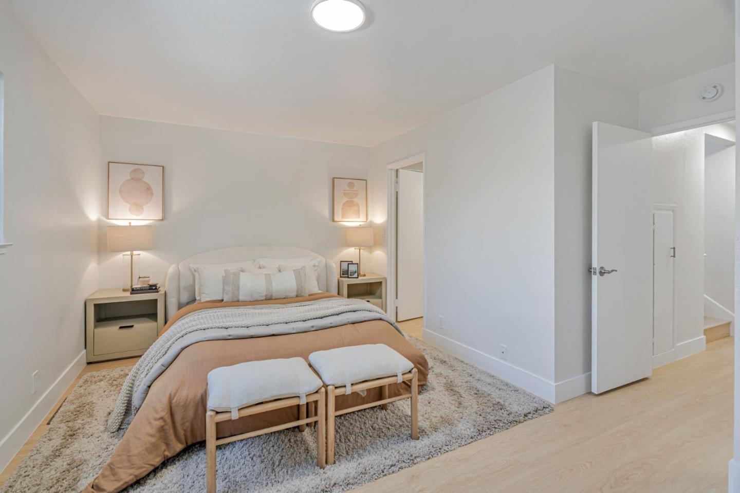 1069 Linda Drive Campbell, CA 95008 - Photo 20 of 39 a bedroom with a bed and a lamp