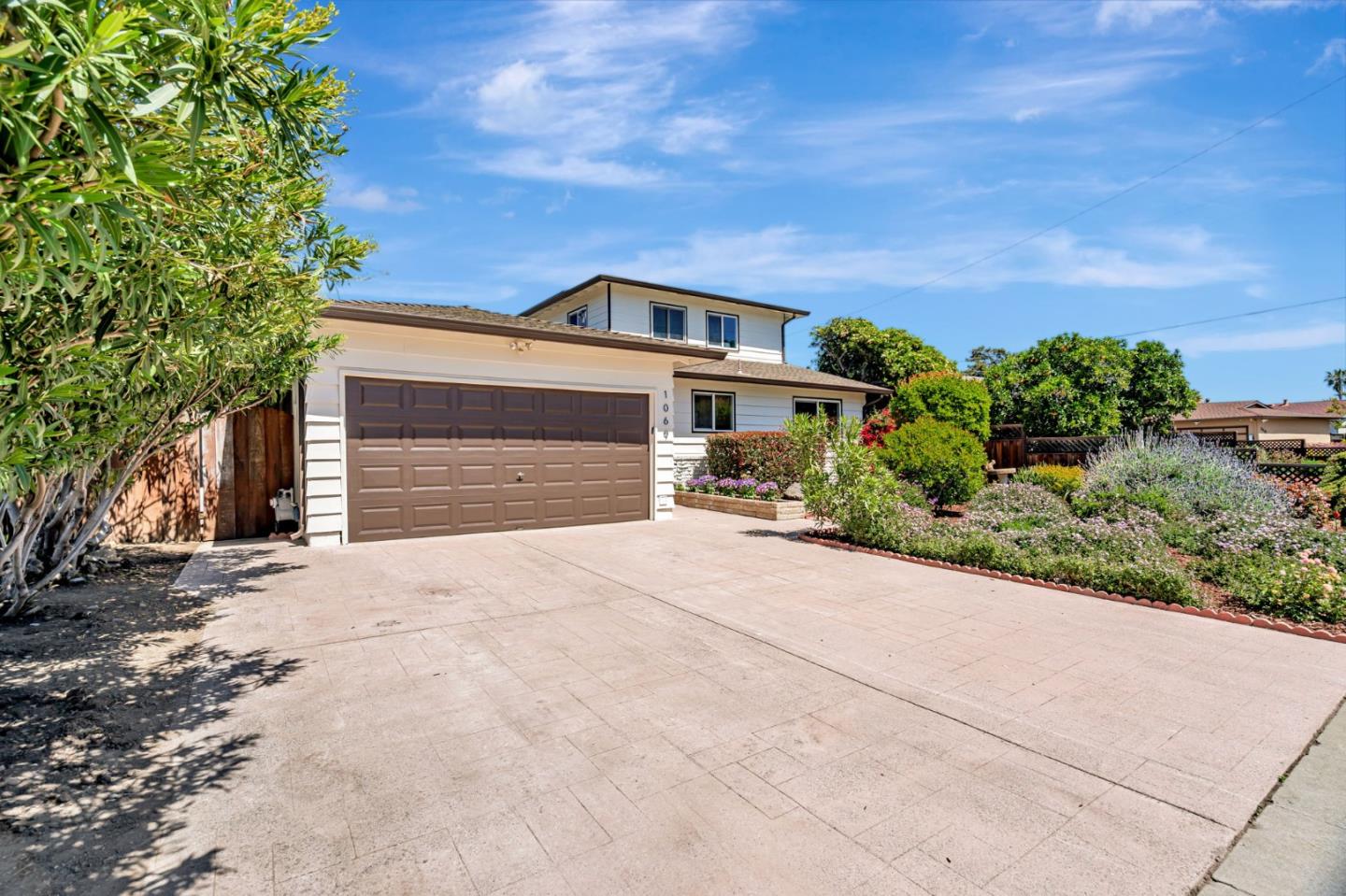 1069 Linda Drive Campbell, CA 95008 - Photo 2 of 39 a front view of a house with a yard