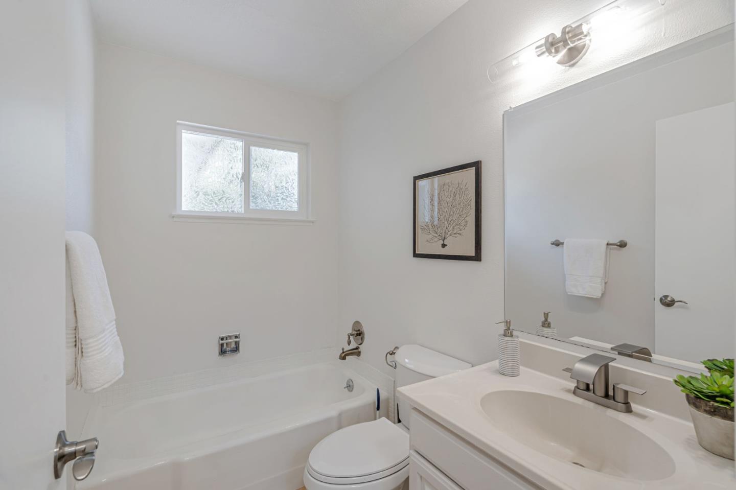 1069 Linda Drive Campbell, CA 95008 - Photo 30 of 39 a bathroom with a toilet sink and bathtub