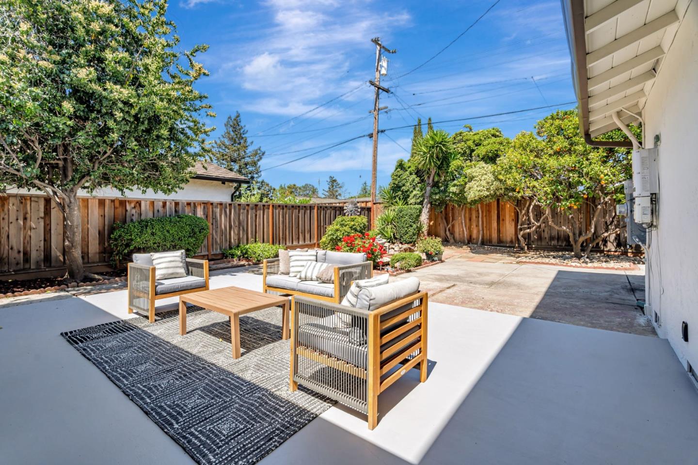 1069 Linda Drive Campbell, CA 95008 - Photo 33 of 39 a view of a patio with couches table and chairs and potted plants