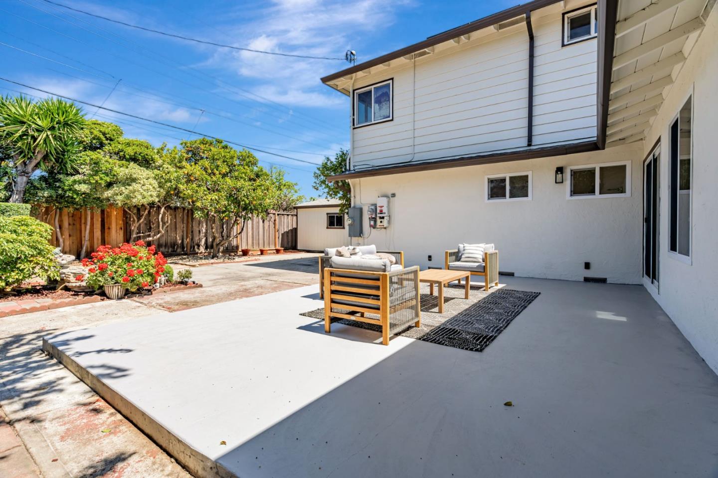 1069 Linda Drive Campbell, CA 95008 - Photo 34 of 39 a view of a patio with a table and chairs under an umbrella