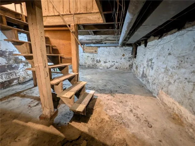 a brick house with a small yard