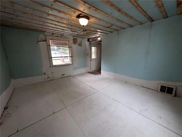 a view of a hallway with a chandelier