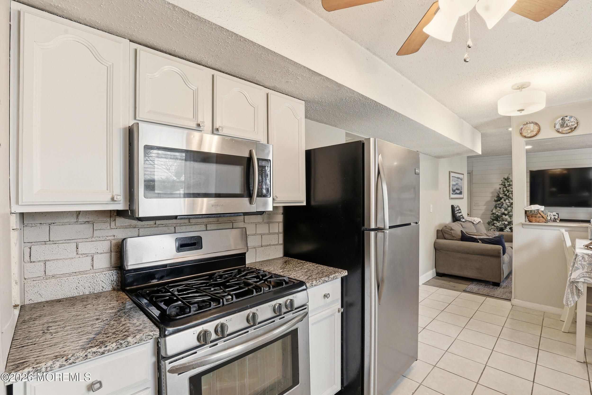 1 Mimi Lane Howell, NJ 07731 - Photo 14 of 26 a kitchen with cabinets and steel stainless steel appliances