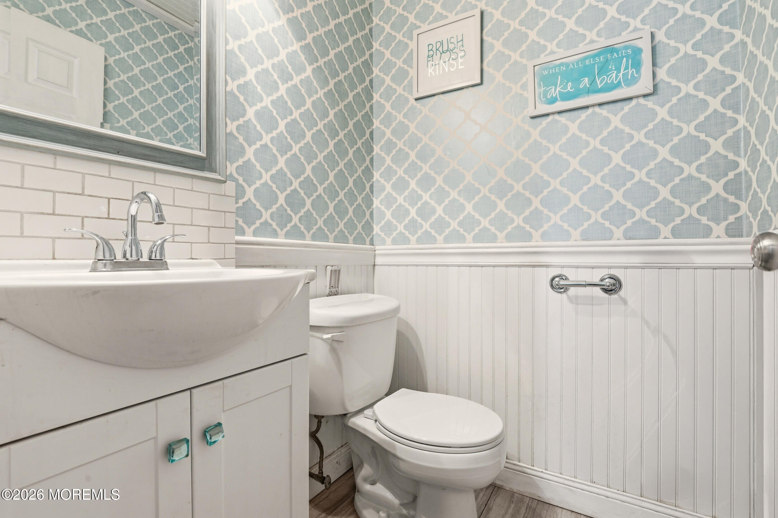 1 Mimi Lane Howell, NJ 07731 - Photo 18 of 26 a bathroom with a sink a toilet and a mirror
