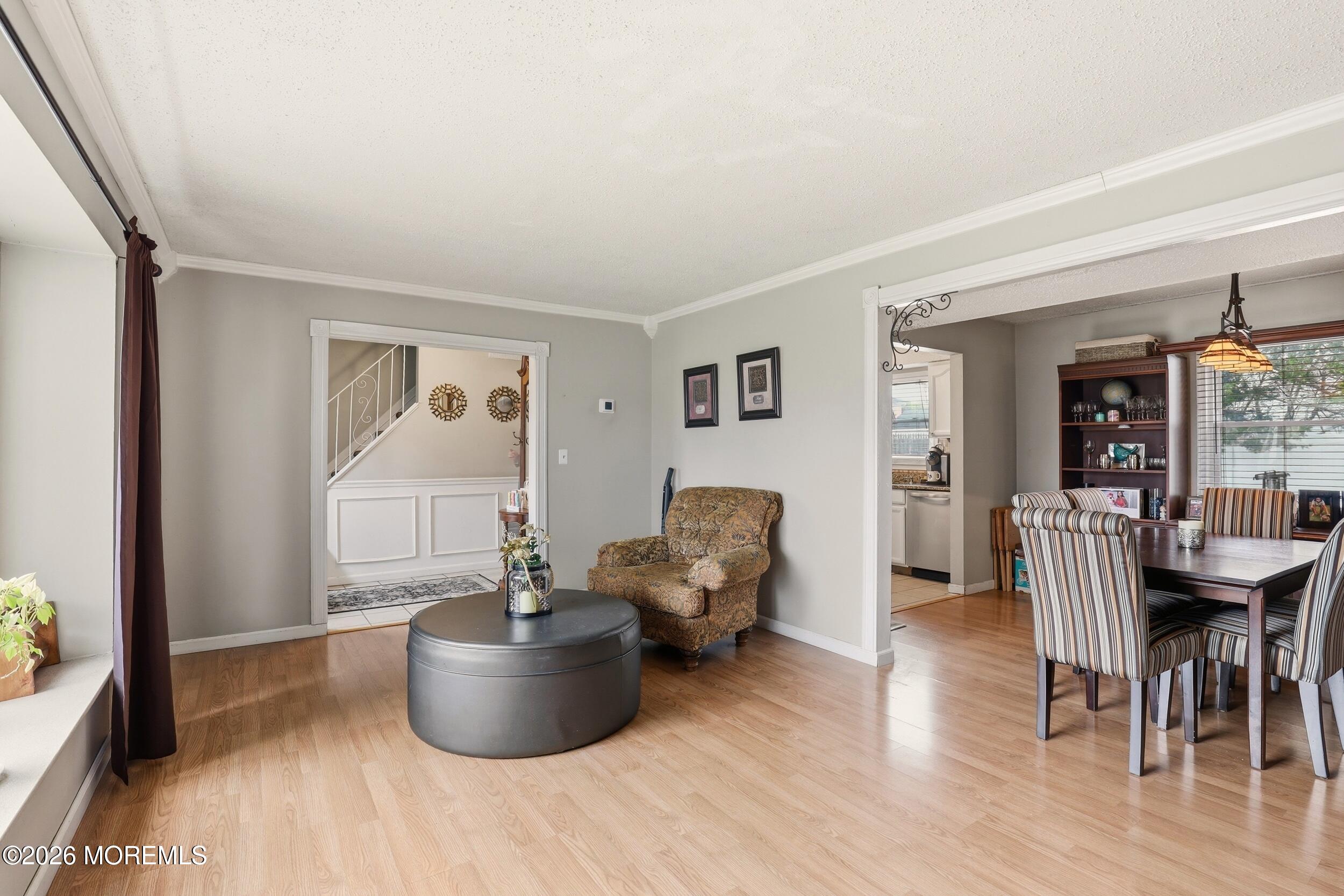 1 Mimi Lane Howell, NJ 07731 - Photo 8 of 26 a living room with furniture and a table