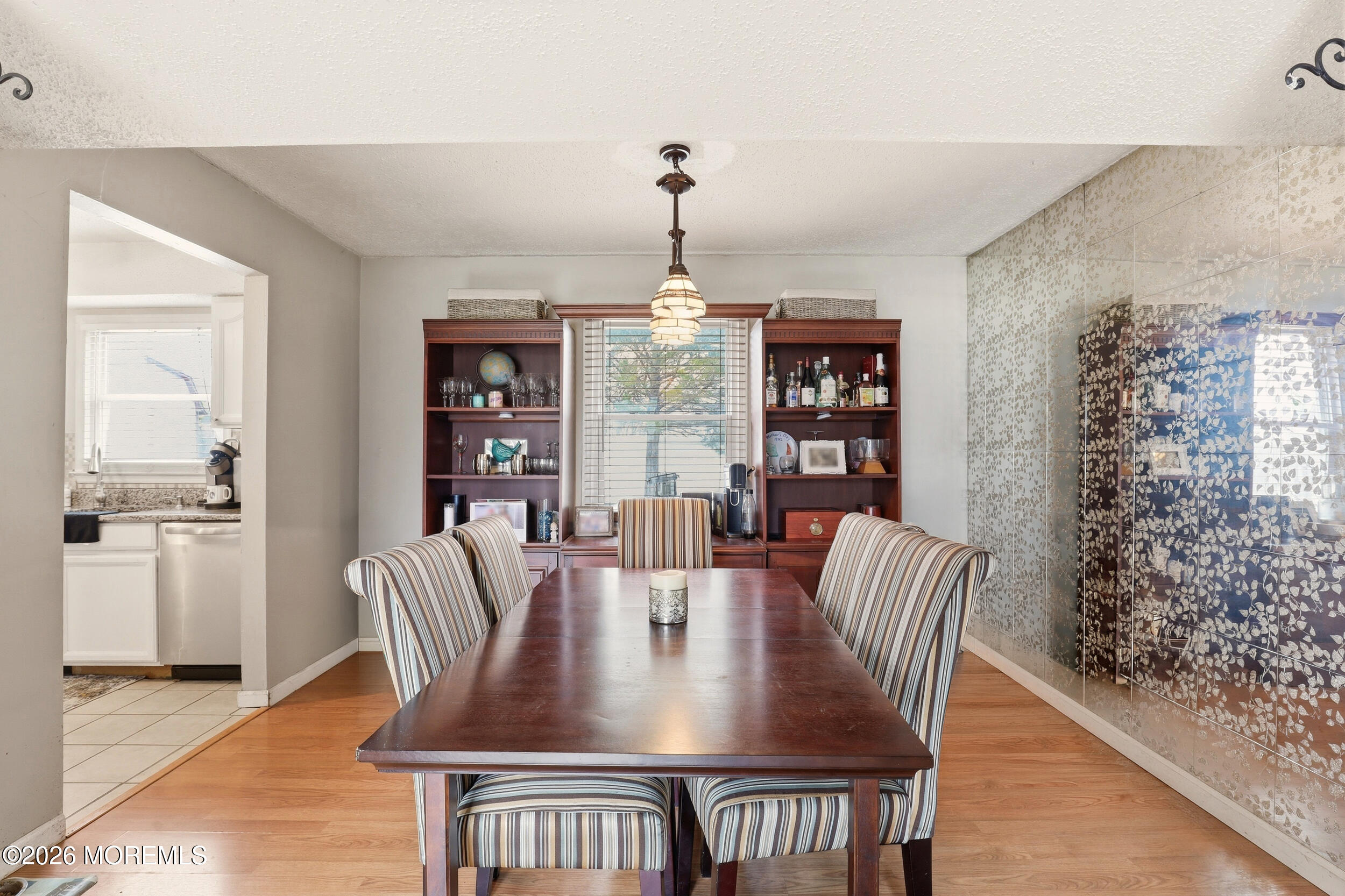 1 Mimi Lane Howell, NJ 07731 - Photo 9 of 26 a view of a dining room with furniture window and wooden floor