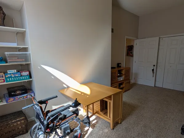 a workspace with furniture and closet