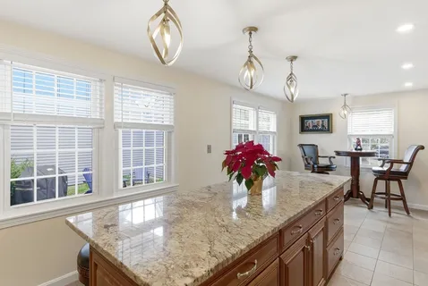 a kitchen with granite countertop lots of counter top space