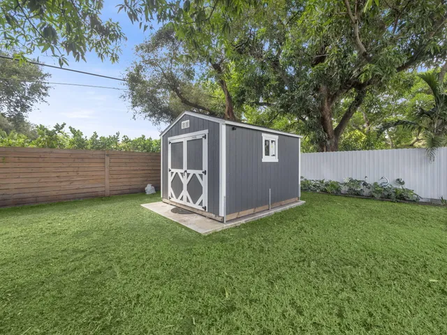 a view of backyard with green space