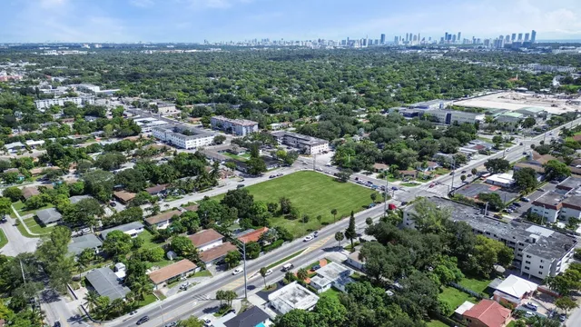 an aerial view of a city with lots of residential buildings