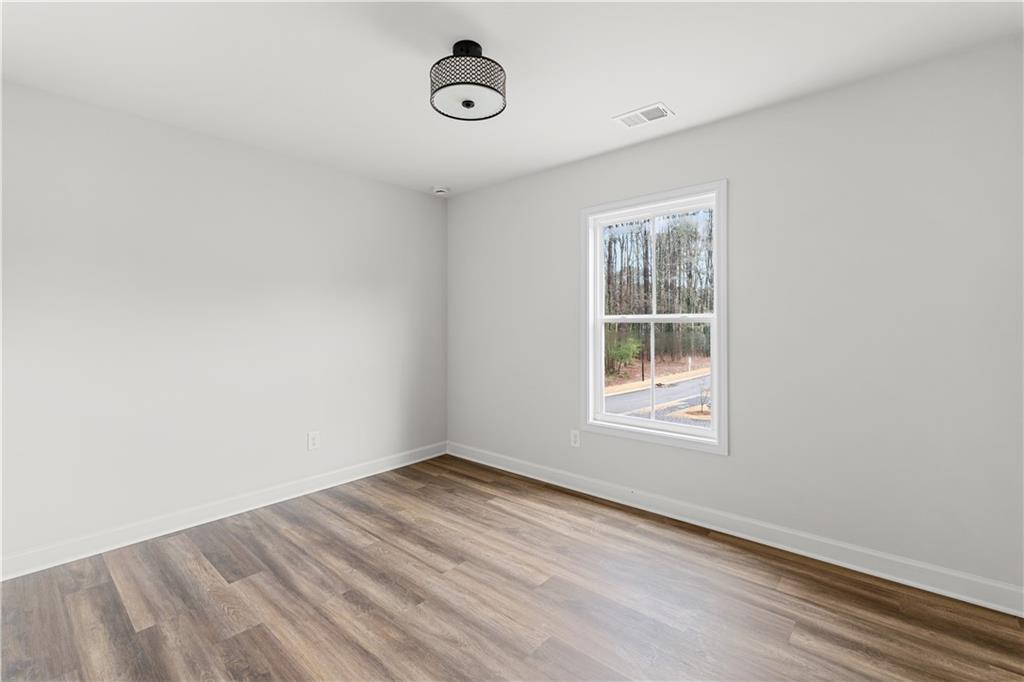 3810 Cottage Circle Clarkston, GA 30021 - Photo 5 of 11 an empty room with a window