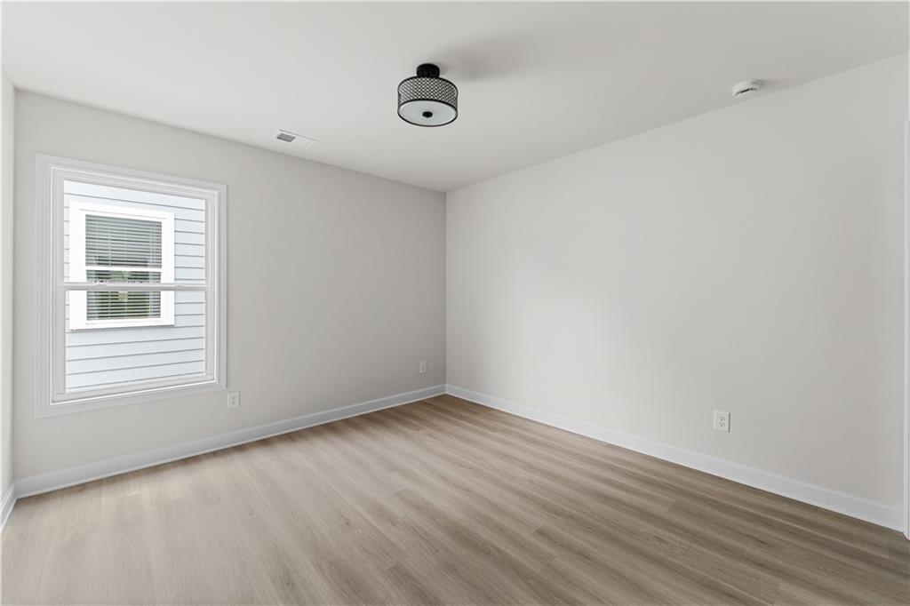 3810 Cottage Circle Clarkston, GA 30021 - Photo 7 of 11 a view of an empty room with a window