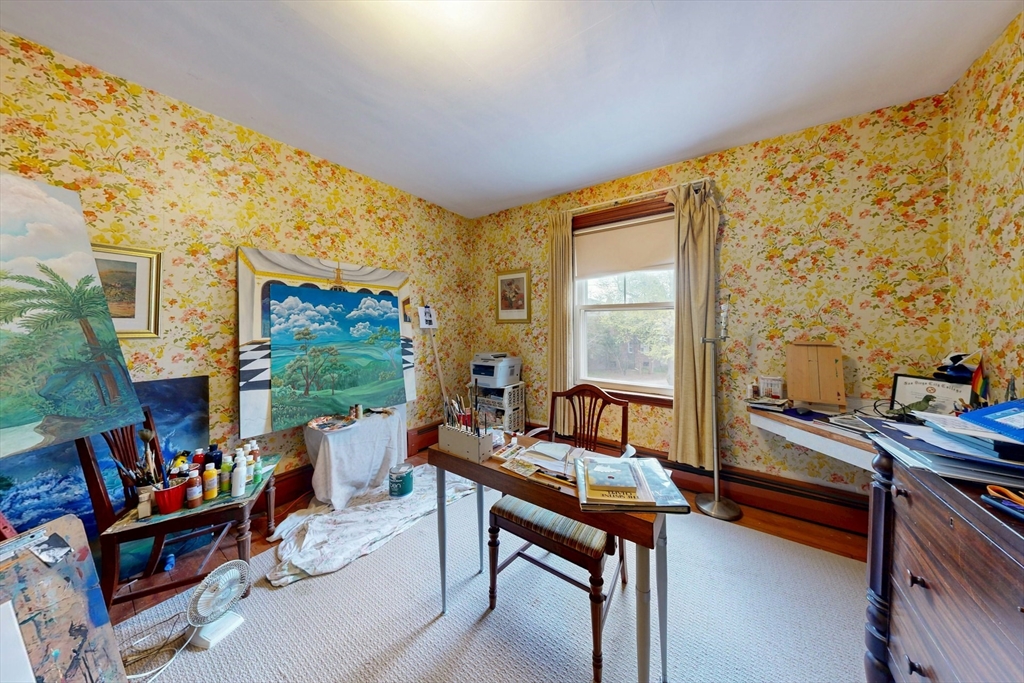 264 Court Road Winthrop, MA 02152 - Photo 21 of 26 a living room with furniture and a floor to ceiling window