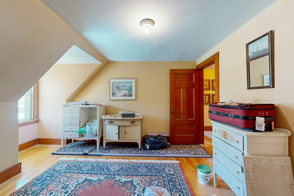 264 Court Road Winthrop, MA 02152 - Photo 22 of 26 a living room with furniture and a rug