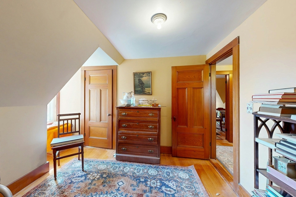 264 Court Road Winthrop, MA 02152 - Photo 23 of 26 a bedroom with furniture and a rug
