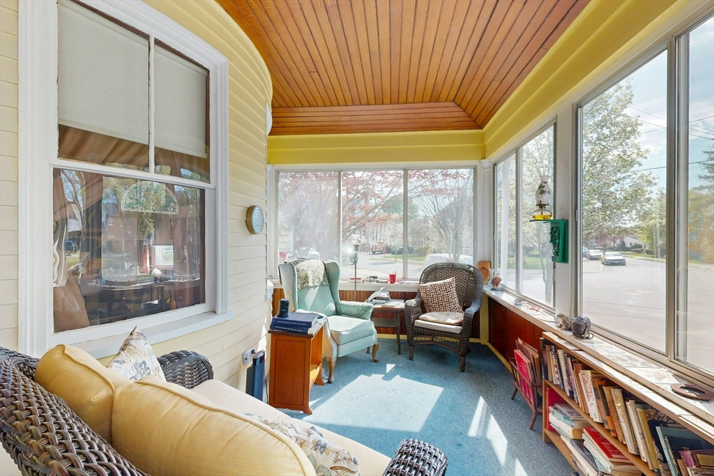 264 Court Road Winthrop, MA 02152 - Photo 4 of 26 a living room with furniture and a floor to ceiling window