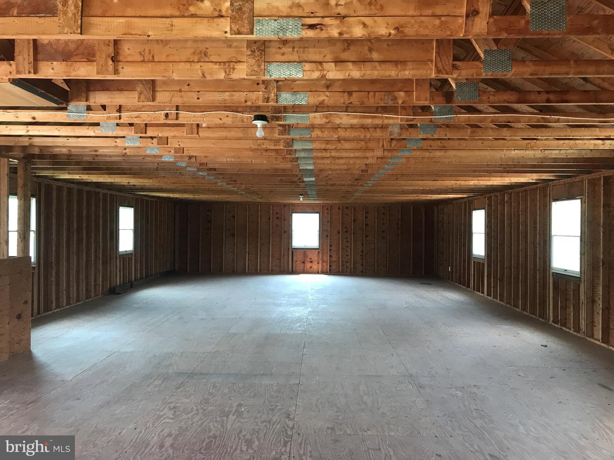 38303 Palmer Road Coltons Point, MD 20626 - Photo 28 of 28 Detached 4-car garage storage space above