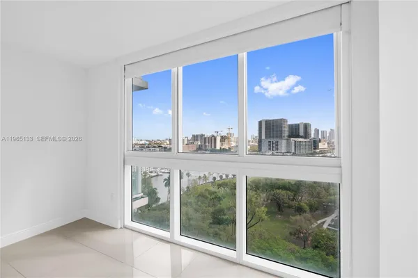 a view of living room with a large window