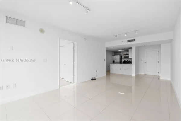 a view of a hallway with a bathroom