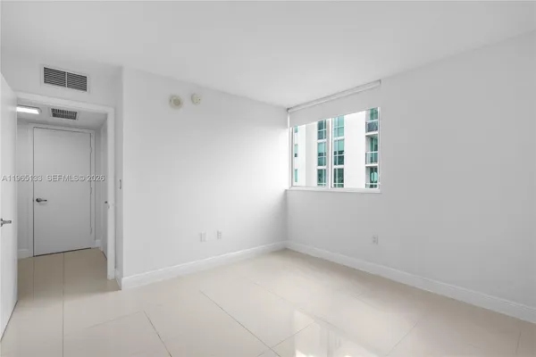 an empty room with a window