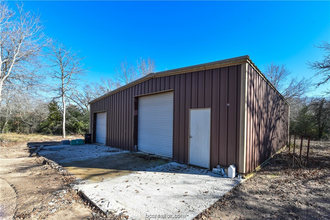 12200 Winn Road Kosse, TX 76653 - Photo 20 of 34 a view of wooden house with a yard