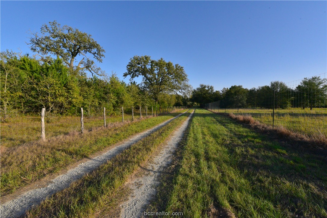 12200 Winn Road Kosse, TX 76653 - Photo 25 of 34 a view of a lake with a yard