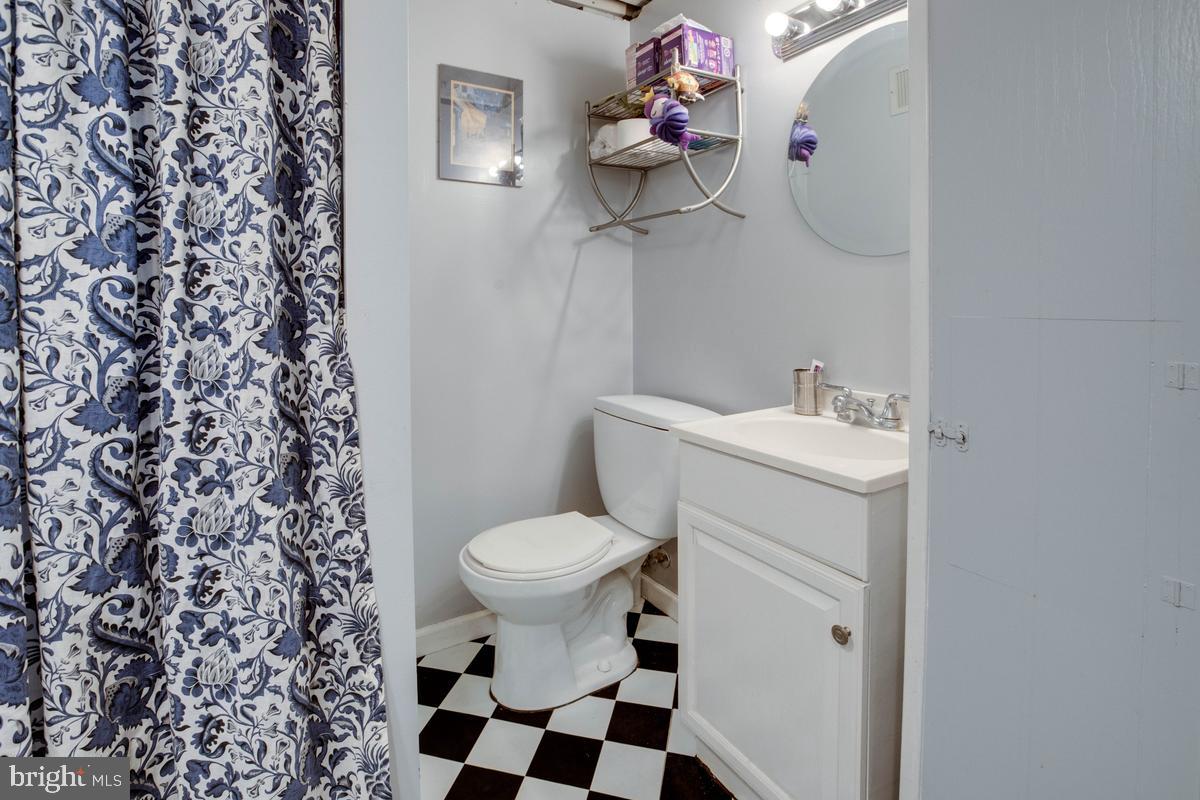 3574 Benzinger Road Baltimore, MD 21229 - Photo 23 of 29 Charming bathroom with classic decor.