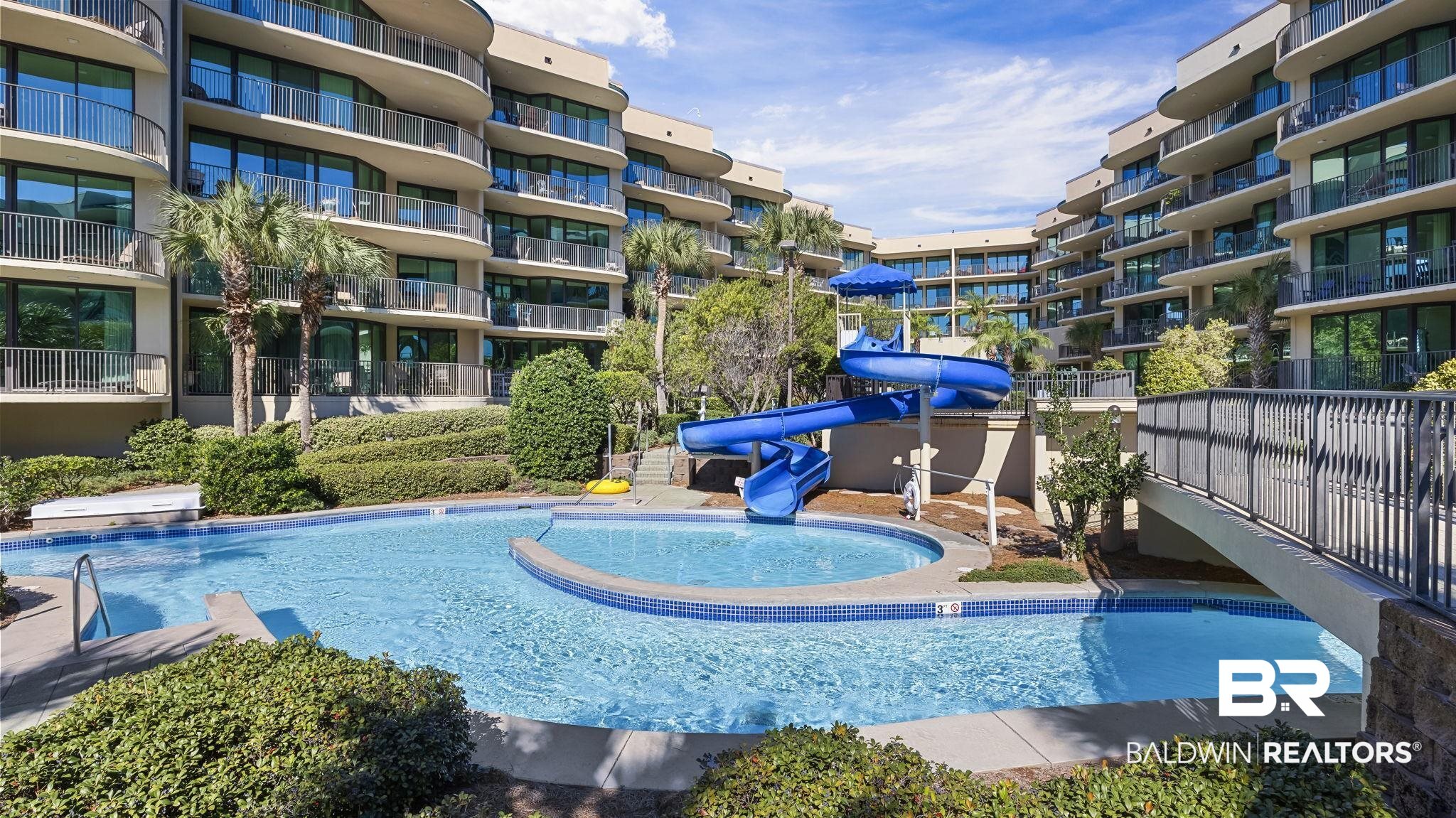 27580 Canal Road, Unit 1526 Orange Beach, AL 36561 - Photo 35 of 49 Community pool featuring a water slide