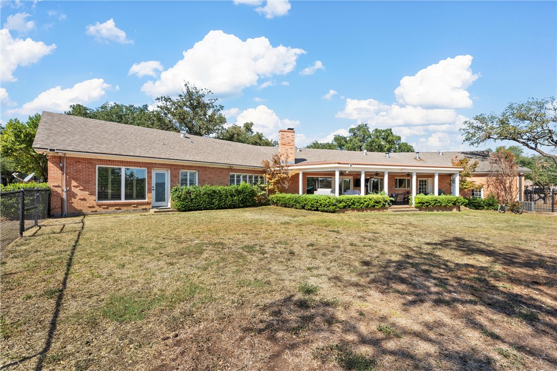 7110 Fish Pond Road Waco, TX 76710 - Photo 36 of 44 a front view of a house with a yard and garage