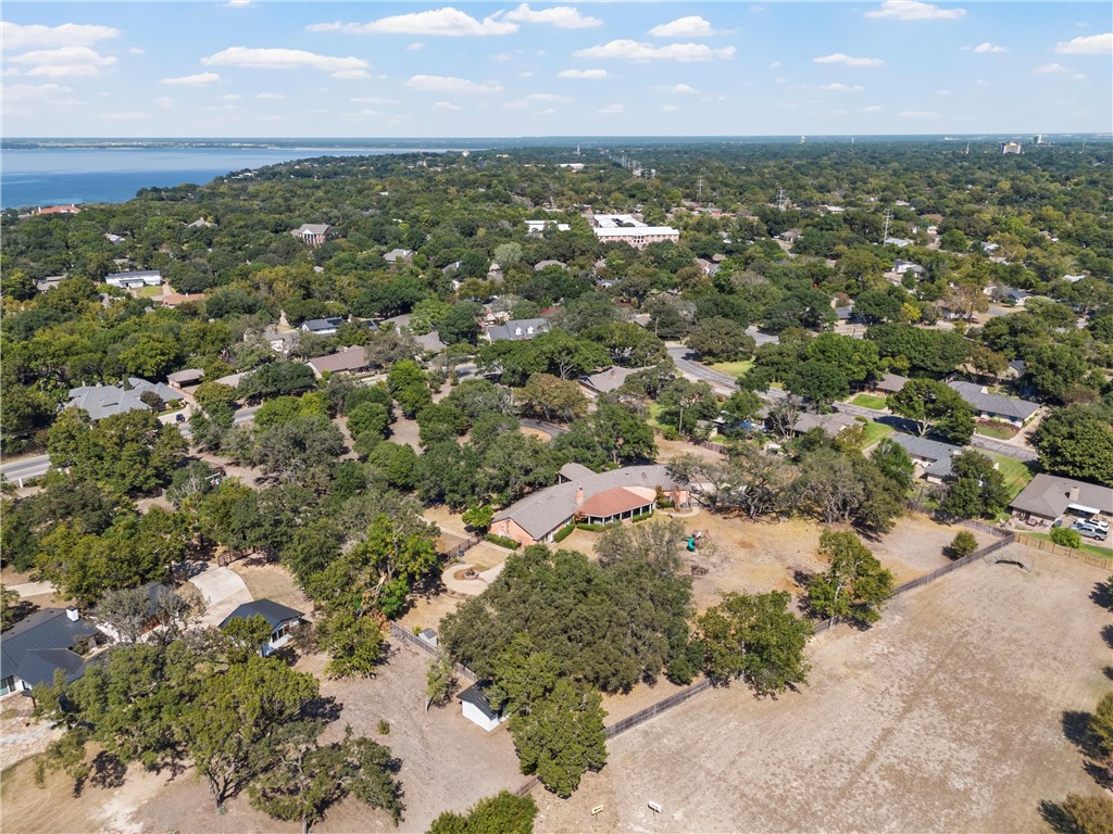 7110 Fish Pond Road Waco, TX 76710 - Photo 44 of 44 an aerial view of residential houses with outdoor space and trees