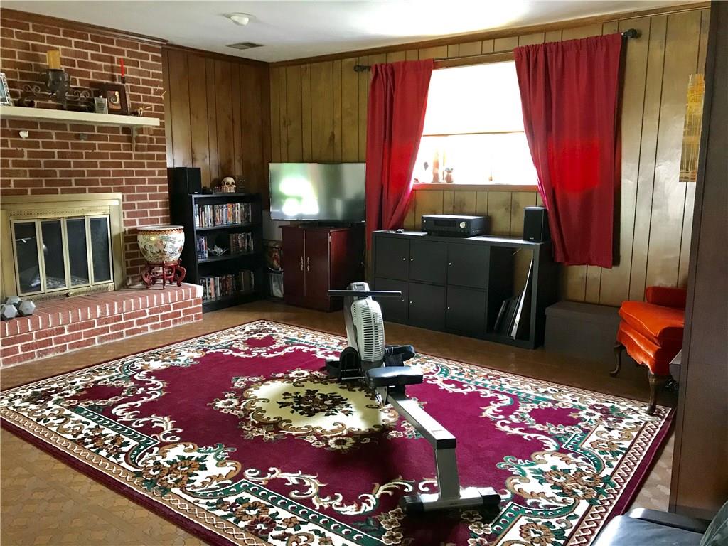 931 Greenhill Road Pittsburgh, PA 15209 - Photo 12 of 16 lower level family room is open to lower level den