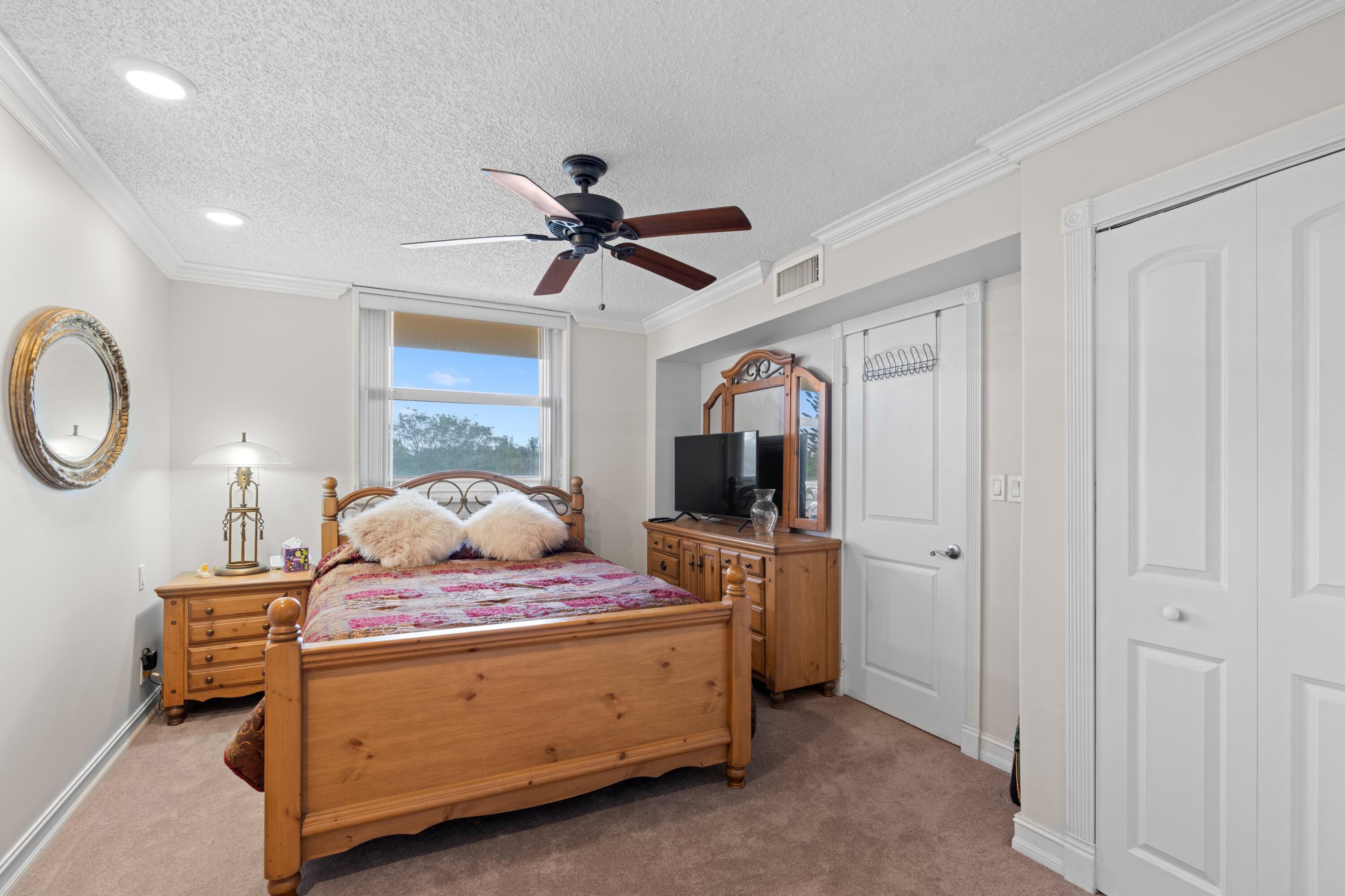 6461 Northwest 2nd Avenue, Unit 415 Boca Raton, FL 33487 - Photo 12 of 25 Guest Bedroom