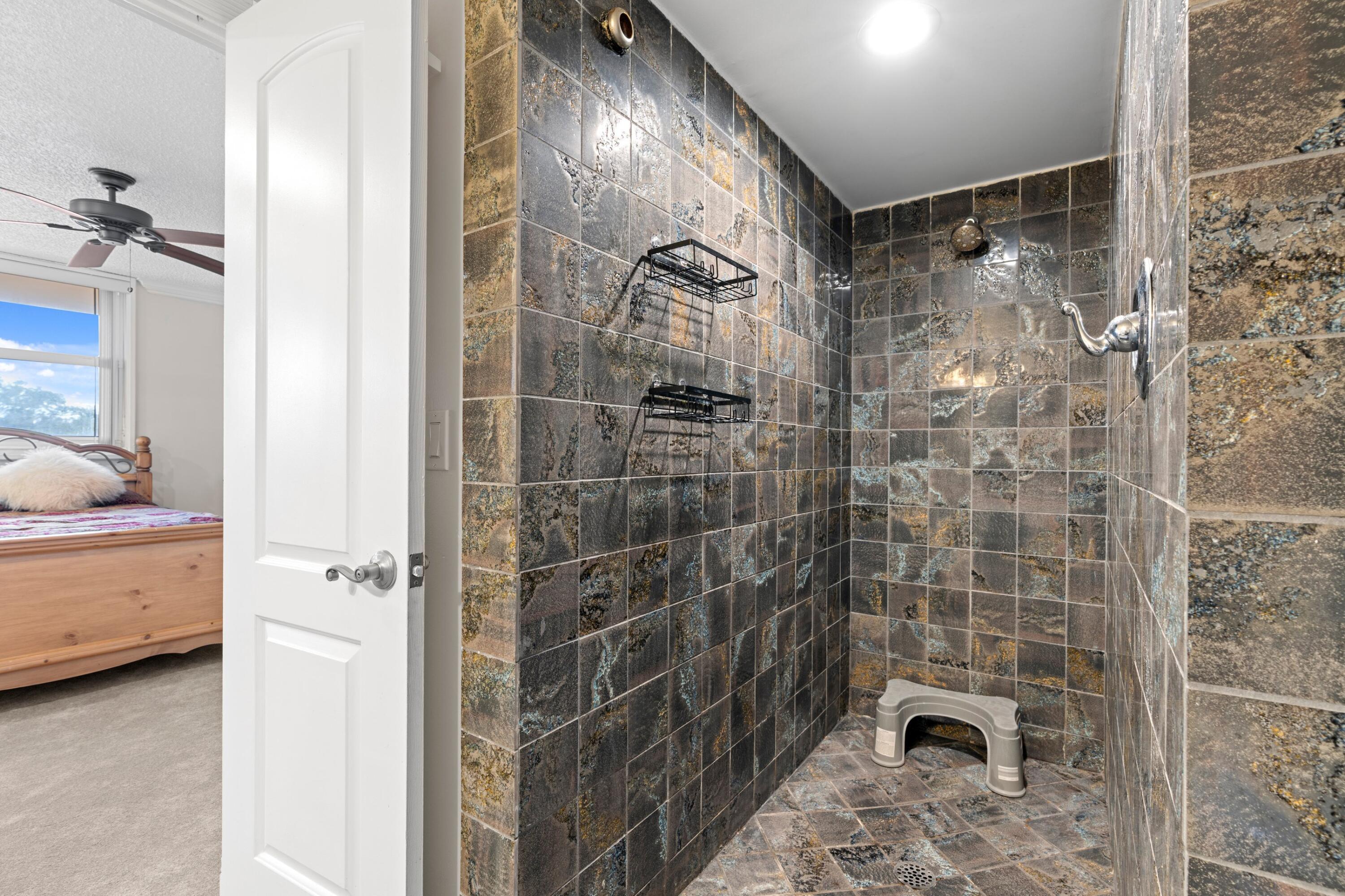 6461 Northwest 2nd Avenue, Unit 415 Boca Raton, FL 33487 - Photo 15 of 25 Guest Bathroom