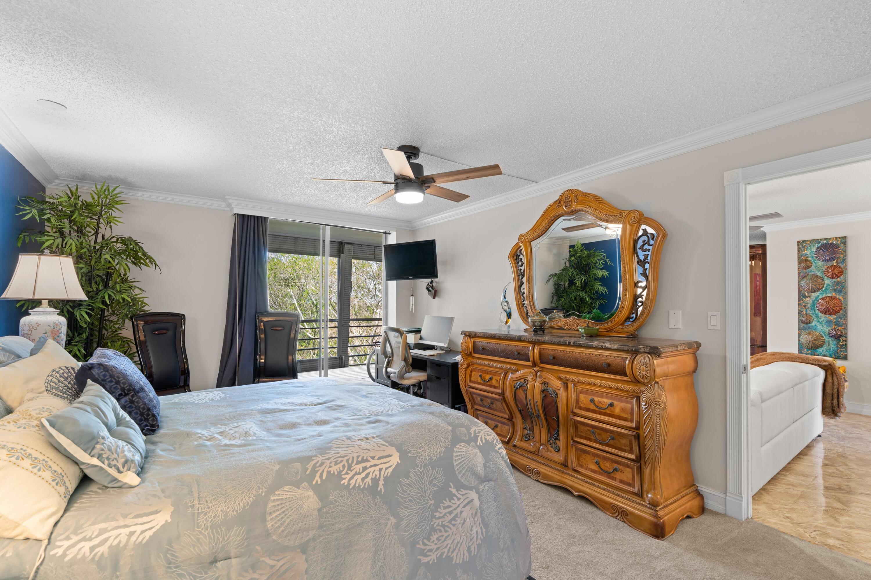 6461 Northwest 2nd Avenue, Unit 415 Boca Raton, FL 33487 - Photo 17 of 25 Primary Bedroom