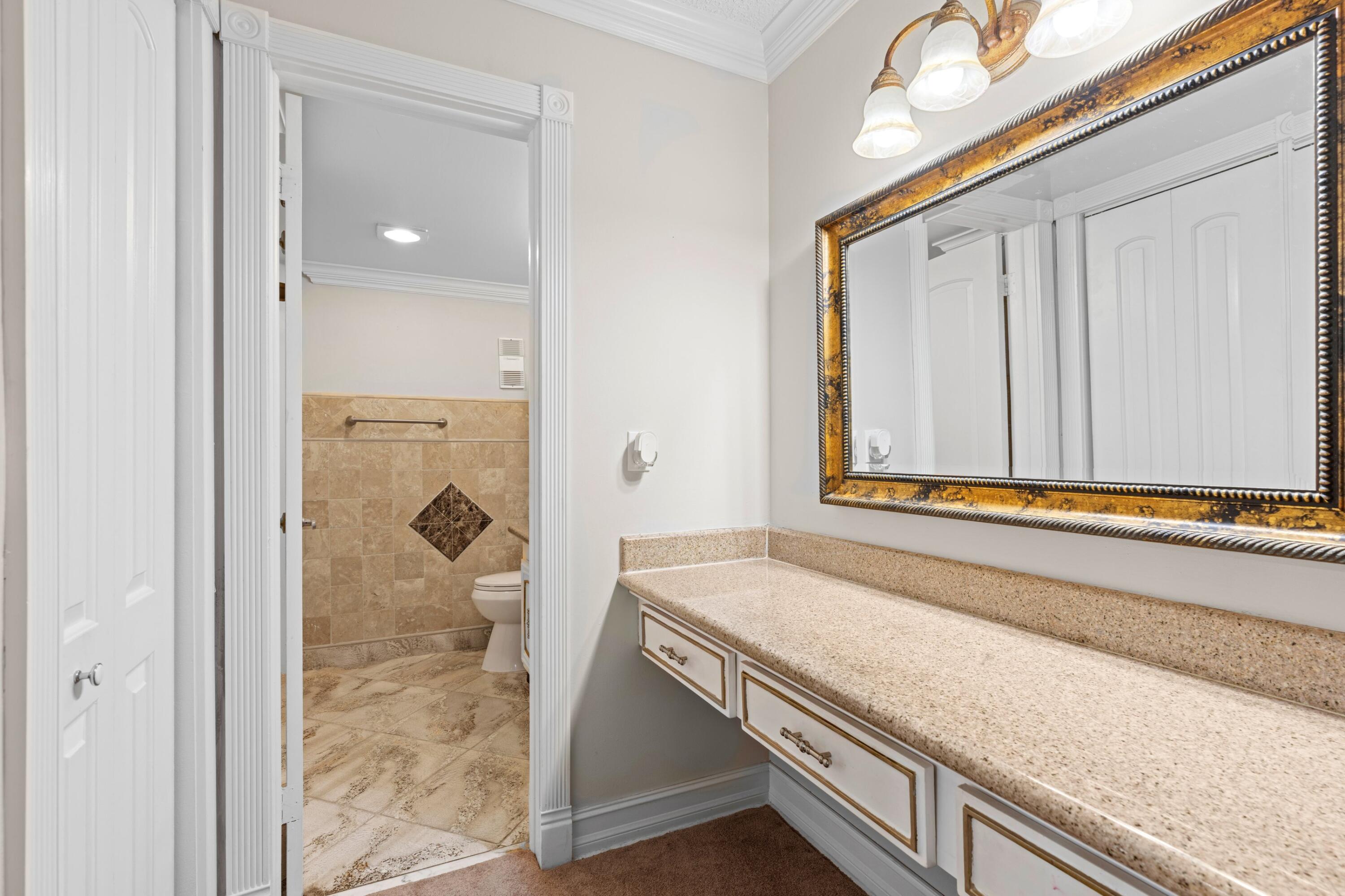 6461 Northwest 2nd Avenue, Unit 415 Boca Raton, FL 33487 - Photo 18 of 25 Primary Bathroom