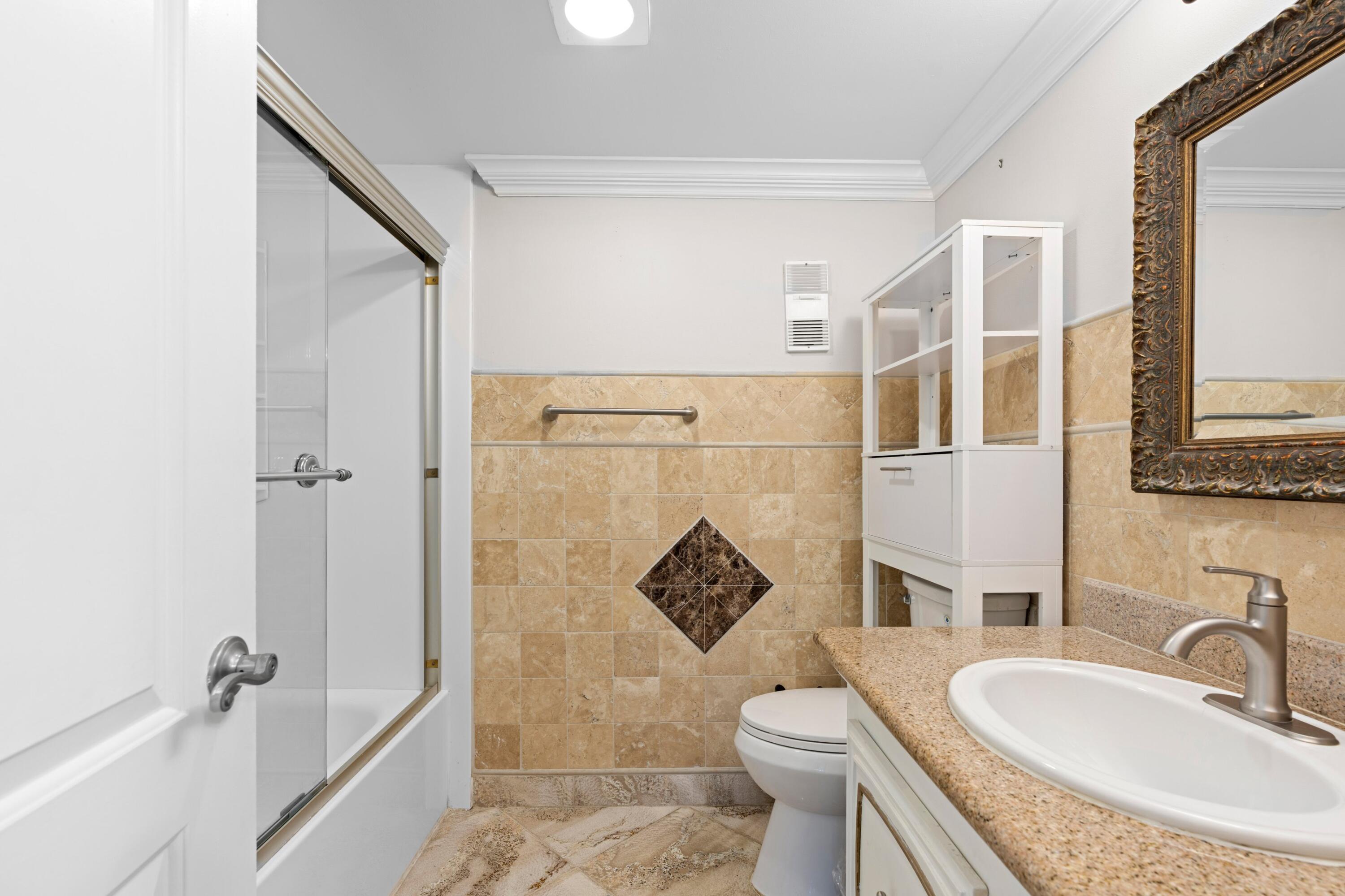 6461 Northwest 2nd Avenue, Unit 415 Boca Raton, FL 33487 - Photo 19 of 25 Primary Bathroom