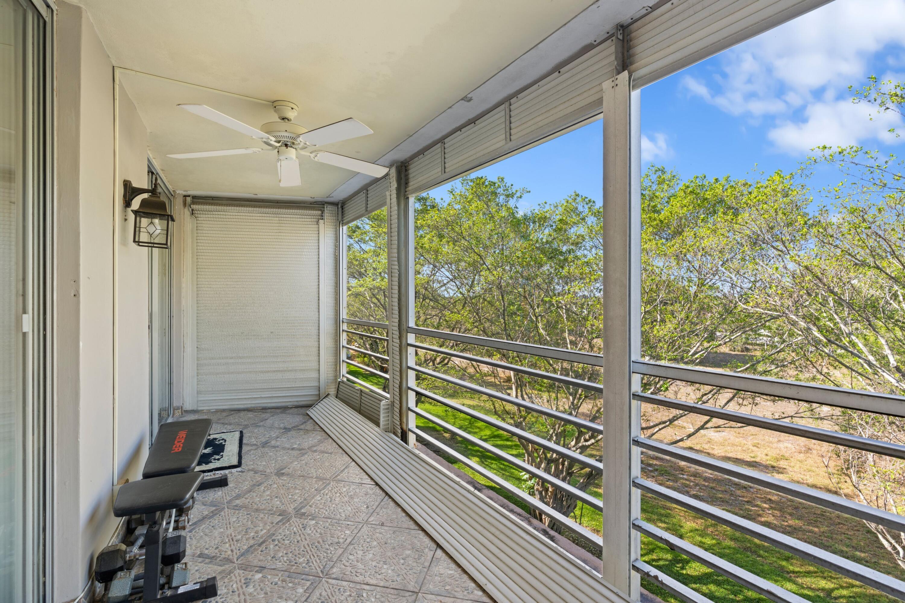 6461 Northwest 2nd Avenue, Unit 415 Boca Raton, FL 33487 - Photo 20 of 25 Screened-In Patio