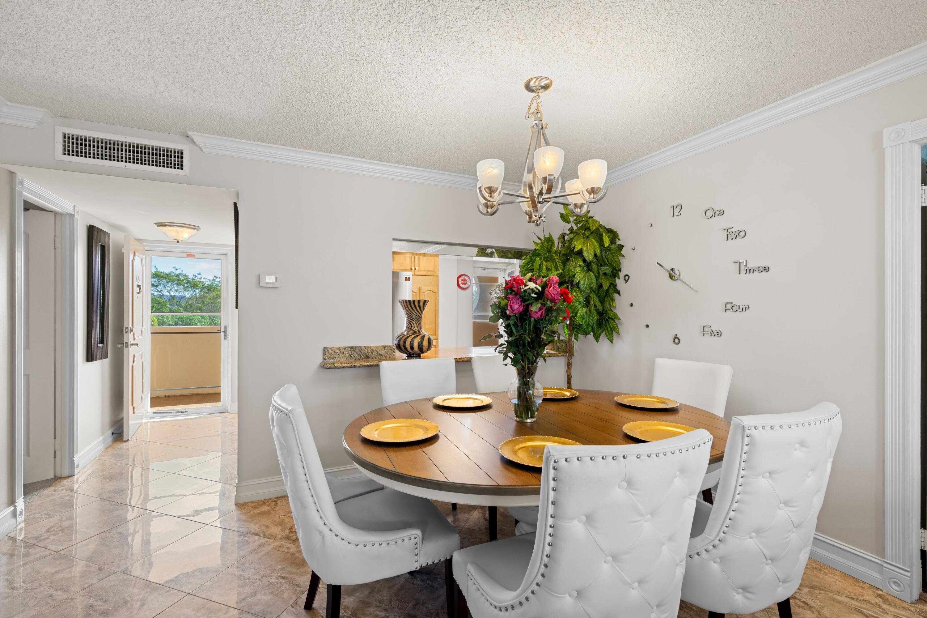 6461 Northwest 2nd Avenue, Unit 415 Boca Raton, FL 33487 - Photo 4 of 25 Informal / Formal Dining Room