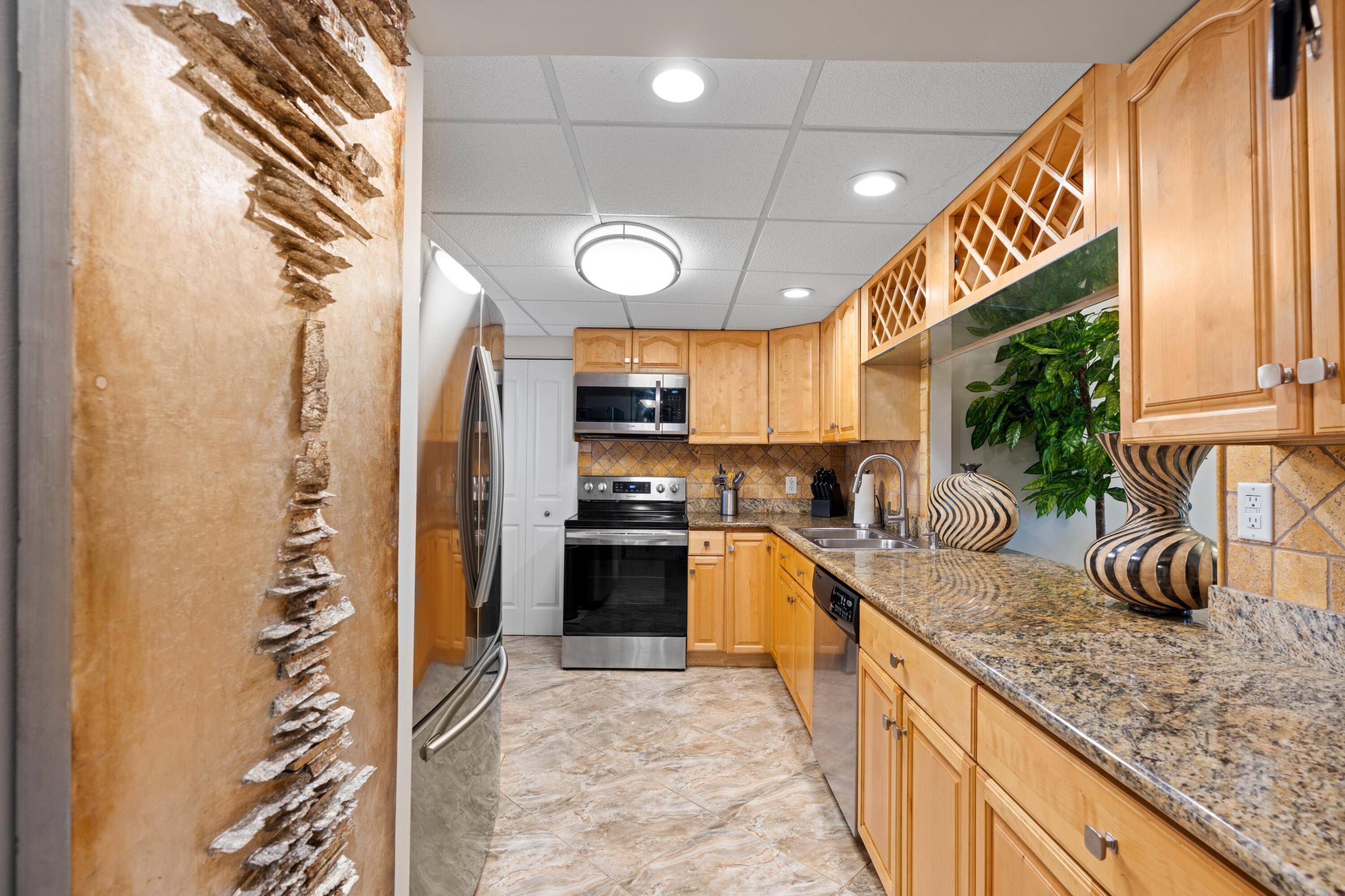 6461 Northwest 2nd Avenue, Unit 415 Boca Raton, FL 33487 - Photo 8 of 25 Kitchen