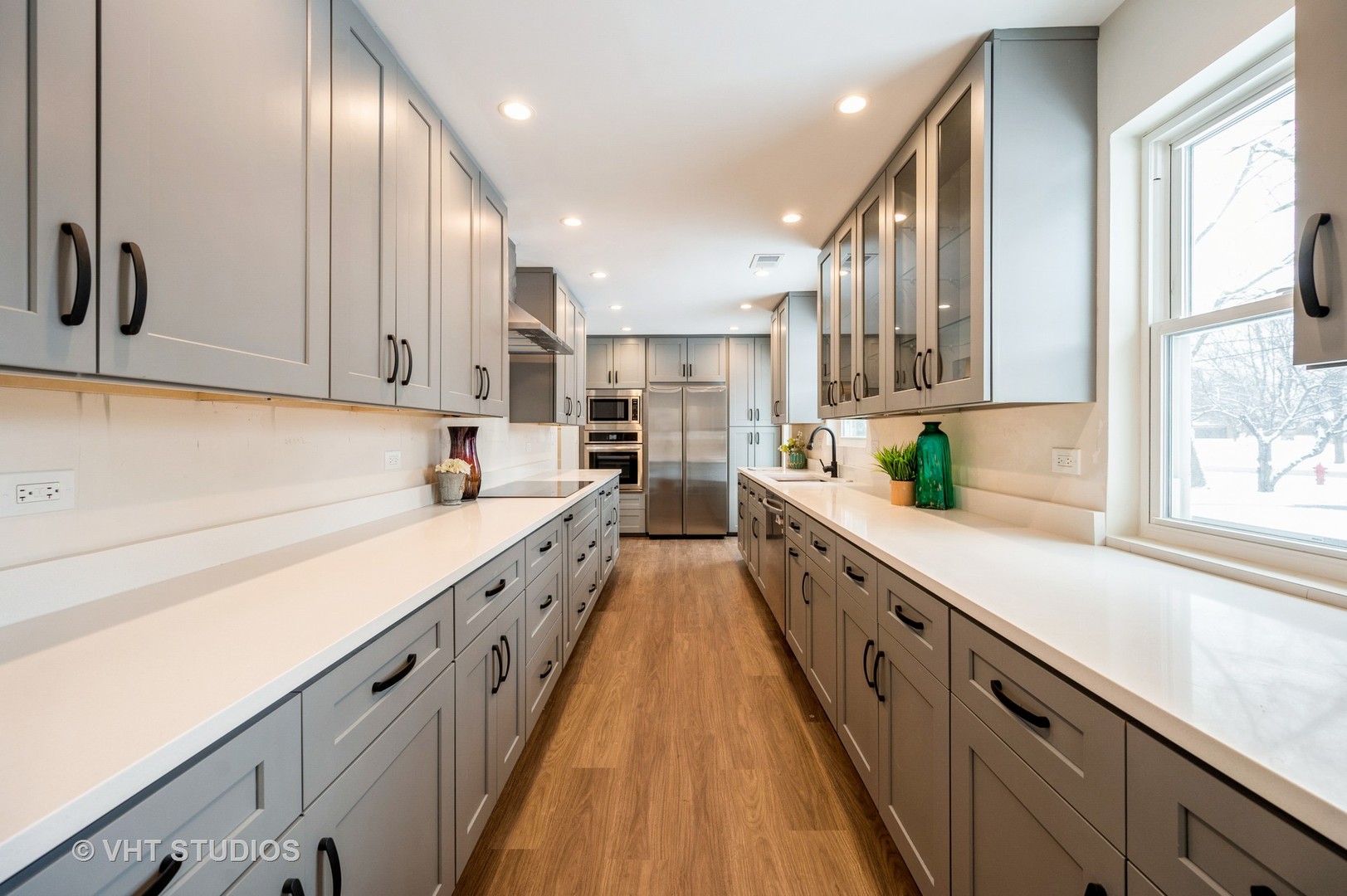 47 Birchwood Road Northbrook, IL 60062 - Photo 6 of 10 a large kitchen with stainless steel appliances granite countertop lots of counter space and a sink