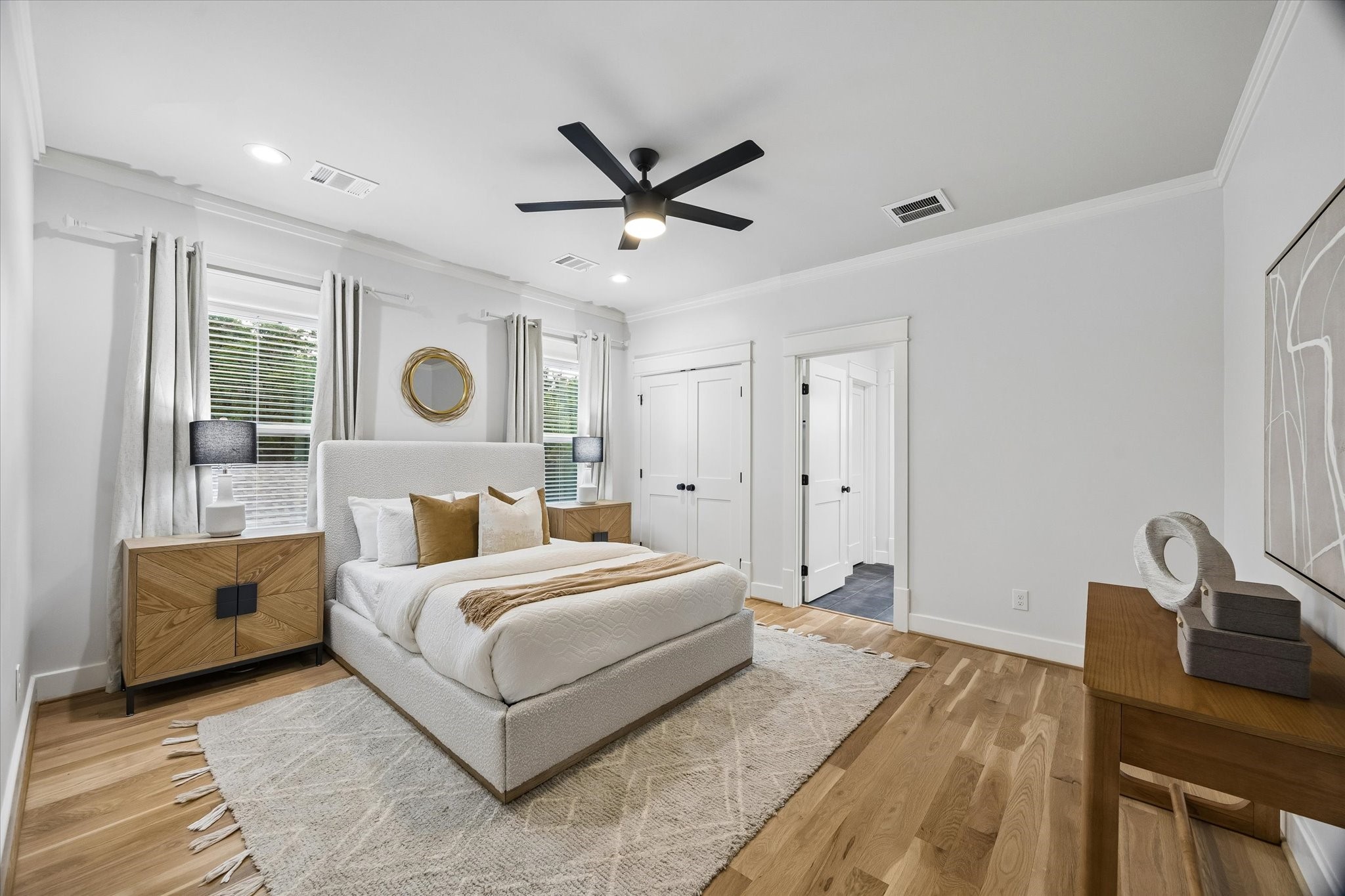 910 Northwood Street Houston, TX 77009 - Photo 17 of 28 a bedroom with a bed and window